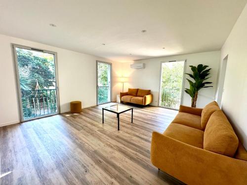 Χώρος καθιστικού στο Appartement avec jardin privé à 2min de la plage
