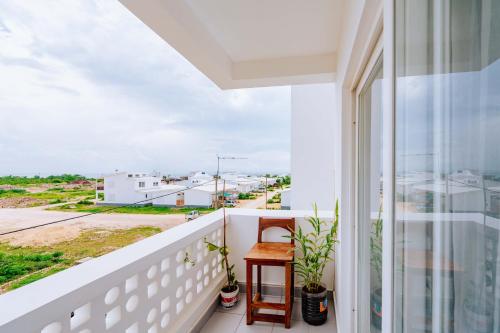 a balcony with a view of a street at Jasiri Apartment, Beautiful ocean-view 2 bedroom home in Fumba Town in Dambani