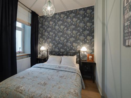 Posteľ alebo postele v izbe v ubytovaní Too-Good Apartments