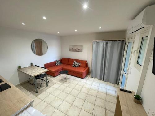 Χώρος καθιστικού στο Studio avec Piscine Parking à 250 m de la plage