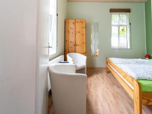 Postel nebo postele na pokoji v ubytování Quiet Garden Apartment