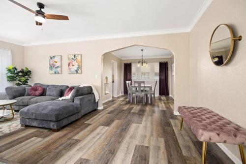 a living room with a couch and a table at Tranquil 3 Bed Retreat Sleeps 7 in Peoria
