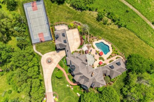 an overhead view of a large estate with a swimming pool at Grand Estate at the Preserve in Youngsdale
