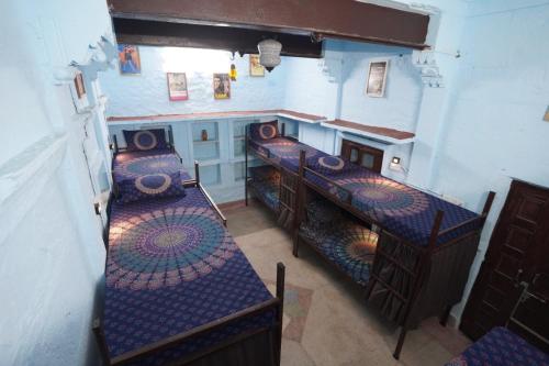 an overhead view of a room with tables and chairs at BlaBla Hostel in Jodhpur