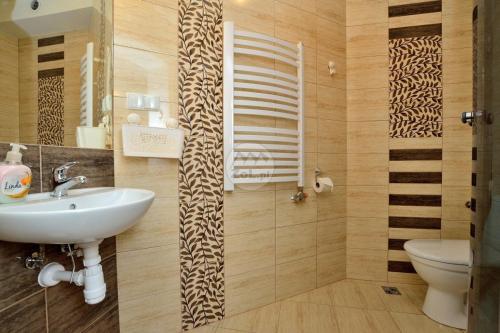 Koupelna v ubytování Willa Swajnos