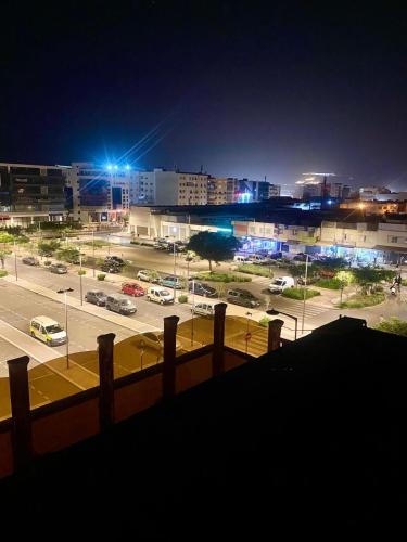 a view of a parking lot at night at Agadir City Appartement in Agadir