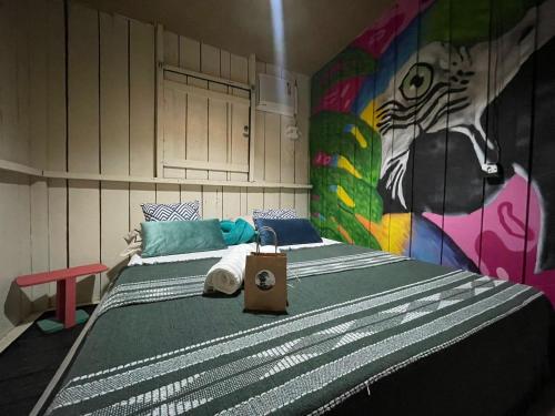Ένα ή περισσότερα κρεβάτια σε δωμάτιο στο Hostel Casa da Cabocla