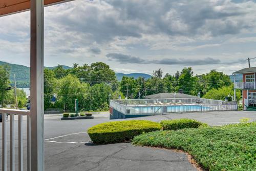 a view of a parking lot with a tennis court at Pinebrook - Three Bedroom House in Lake George