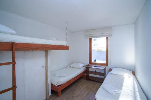 Postel nebo postele na pokoji v ubytování Refugio Dúplex en Centro de Ski La Parva, Farellones - Departamento para 8 personas! Del 25 al 29 de agosto