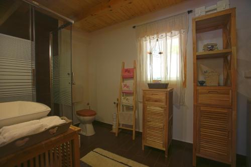 Koupelna v ubytování Brvnara Moj san - Log cabin My Dream