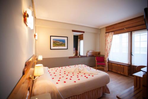 Katil atau katil-katil dalam bilik di Hotel Kaype - Quintamar