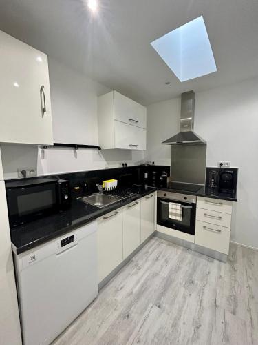Η κουζίνα ή μικρή κουζίνα στο Aquitain Home chambre studio appartement Gare Saint Jean