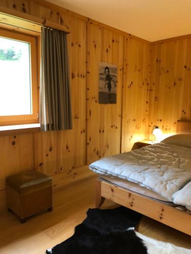 Postel nebo postele na pokoji v ubytování Poschiavo Maiensäss auf 1400m