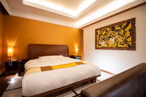 Postel nebo postele na pokoji v ubytování HOTEL LOTUS Superior RESORT NRT
