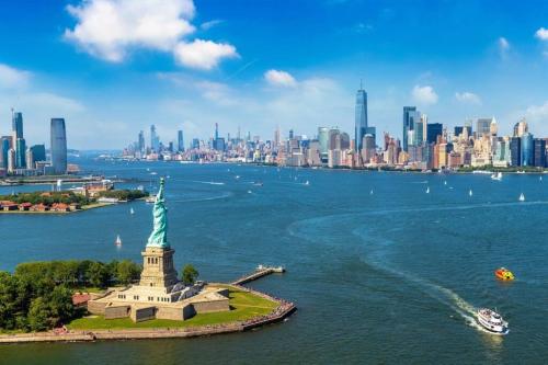 a view of the statue of liberty and the city at Luxury Gated home near NYC and EWR with free Parking in Elizabeth
