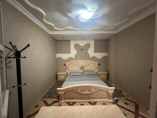 Ένα ή περισσότερα κρεβάτια σε δωμάτιο στο appartement Annakhil