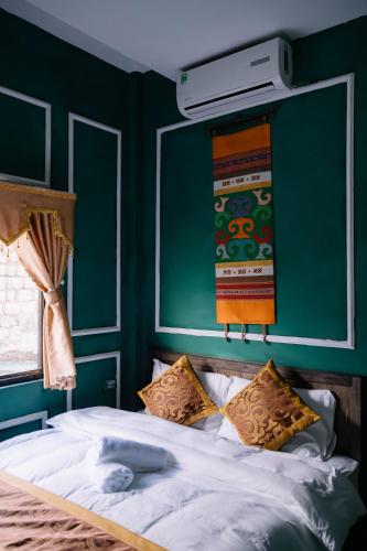 Ένα ή περισσότερα κρεβάτια σε δωμάτιο στο D Home Ha Giang