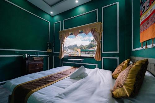 Ένα ή περισσότερα κρεβάτια σε δωμάτιο στο D Home Ha Giang