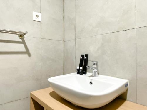 Koupelna v ubytování Simply Look Studio at Pollux Chadstone Apartment By Travelio