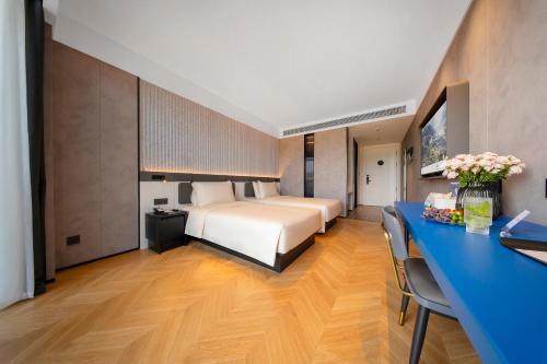 Postel nebo postele na pokoji v ubytování Atour Light Hotel Chongqing Hechuan Sports Center
