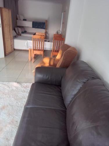 Χώρος καθιστικού στο Woodpecker Guesthouse Middelburg Mpumalanga