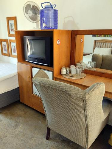 Ένα ή περισσότερα κρεβάτια σε δωμάτιο στο Woodpecker Guesthouse Middelburg Mpumalanga