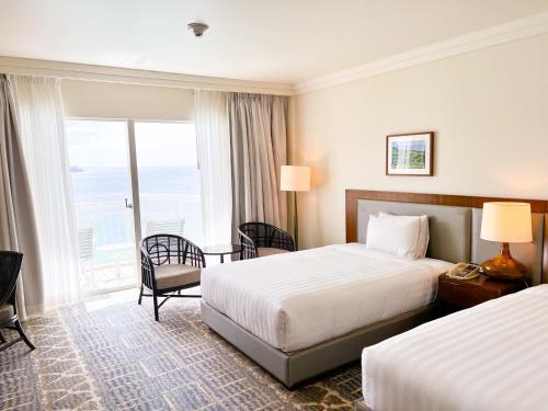 Cama o camas de una habitación en Lotte Hotel Guam