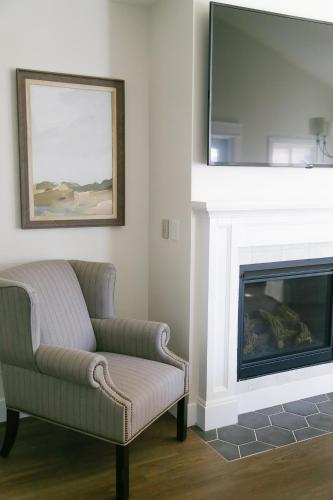 a living room with a couch and a fireplace at Homestead Resort in Midway