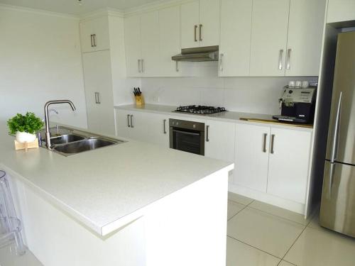 Dapur atau dapur kecil di Marina Belle