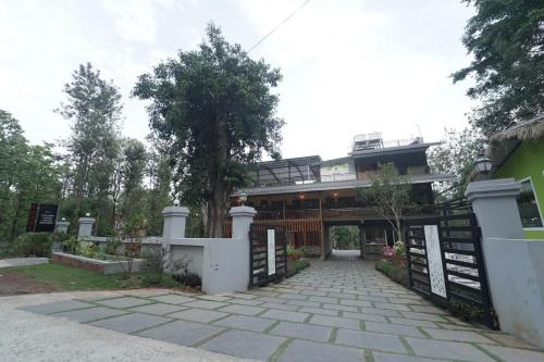 a building with a gate in front of it at Tuskermark Safari Retreat in Kutta