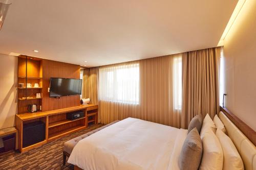 Μια τηλεόραση ή/και κέντρο ψυχαγωγίας στο Hotel Uri&