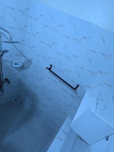 Ванная комната в JACARANDA HOMESTAY