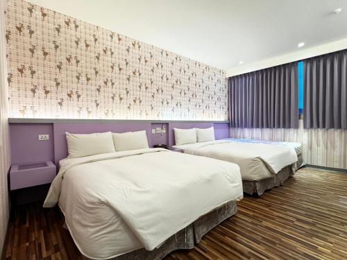 Postel nebo postele na pokoji v ubytování 191 Hotel