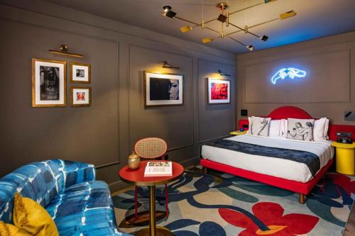 Ένα ή περισσότερα κρεβάτια σε δωμάτιο στο Upon Angels - Adults Only