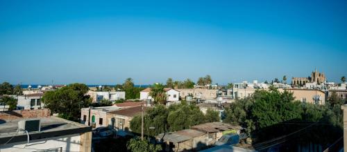 a view of a city with buildings and trees at Diamante Guest House-Ground in Mağusa
