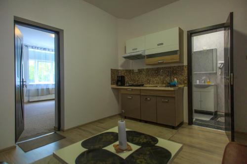 Dapur atau dapur kecil di Nobless Boutique Residence