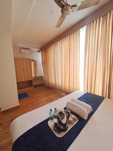 Postel nebo postele na pokoji v ubytování Sky Inn