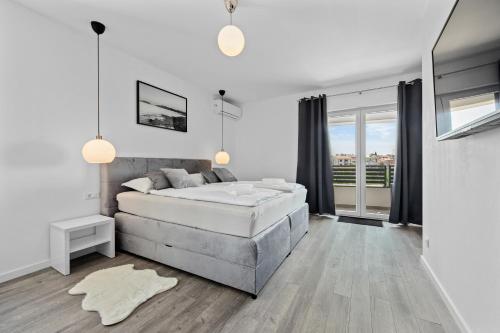 Giường trong phòng chung tại Villa Belica