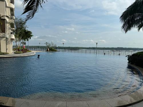 a large pool of water in front of a building at Bay Laurel Country Garden 2卧室 海景房 Danga Bay in Johor Bahru