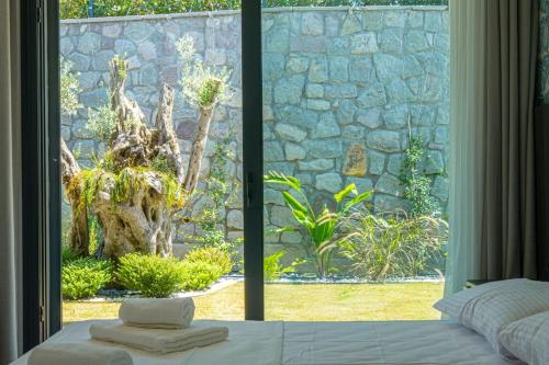 Ένα ή περισσότερα κρεβάτια σε δωμάτιο στο Villa Romeo With Private Pool