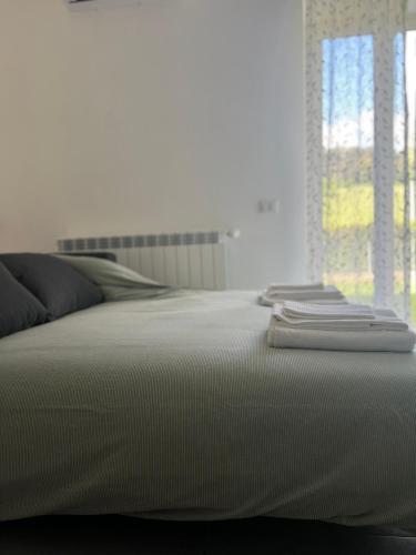 Postel nebo postele na pokoji v ubytování Il tuo rifugio perfetto!