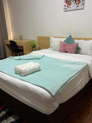 Postel nebo postele na pokoji v ubytování Pastello guest house