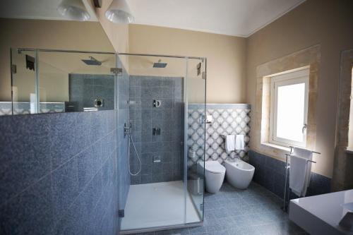 Koupelna v ubytování Lanterne Magiche Ortigia Suites