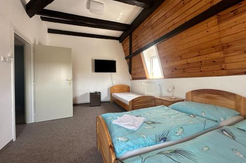 Postel nebo postele na pokoji v ubytování Hotel RON