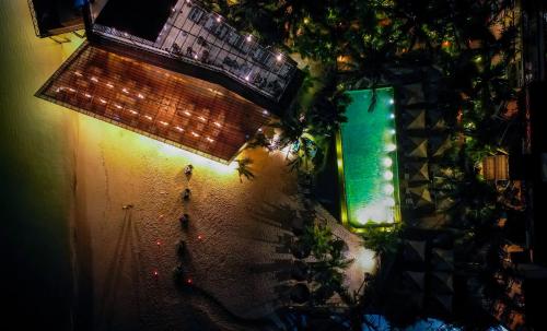 an overhead view of a building with a pool at night at Z Hotel & Z2 Hotel in Nungwi
