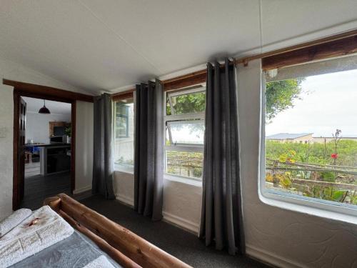 Katil atau katil-katil dalam bilik di Garden Route Self-Catering