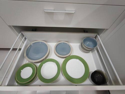 a drawer with four differentiatesiatesiatesiatesiatesiatesiatesiatesiatesktopktop at Kuching Gala City Apartment in Kuching