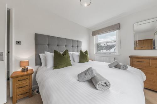 Postel nebo postele na pokoji v ubytování Derwent Cottage