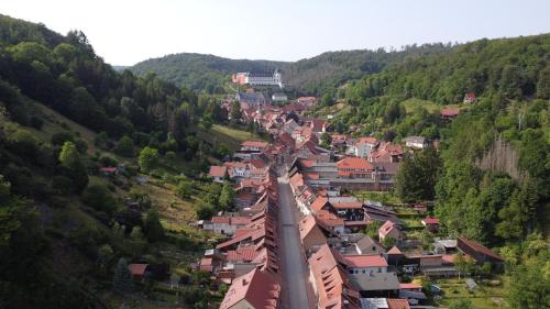 an aerial view of a town in the mountains at Häuslers Herberge in Stolberg i. Harz
