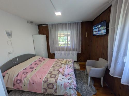 Cama ou camas em um quarto em Villa MIR